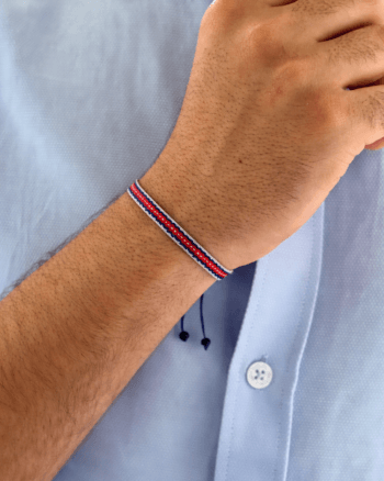 Red blue woven fabric bracelet for men with adjustable knot closure, designed for everyday casual wear in Egypt.